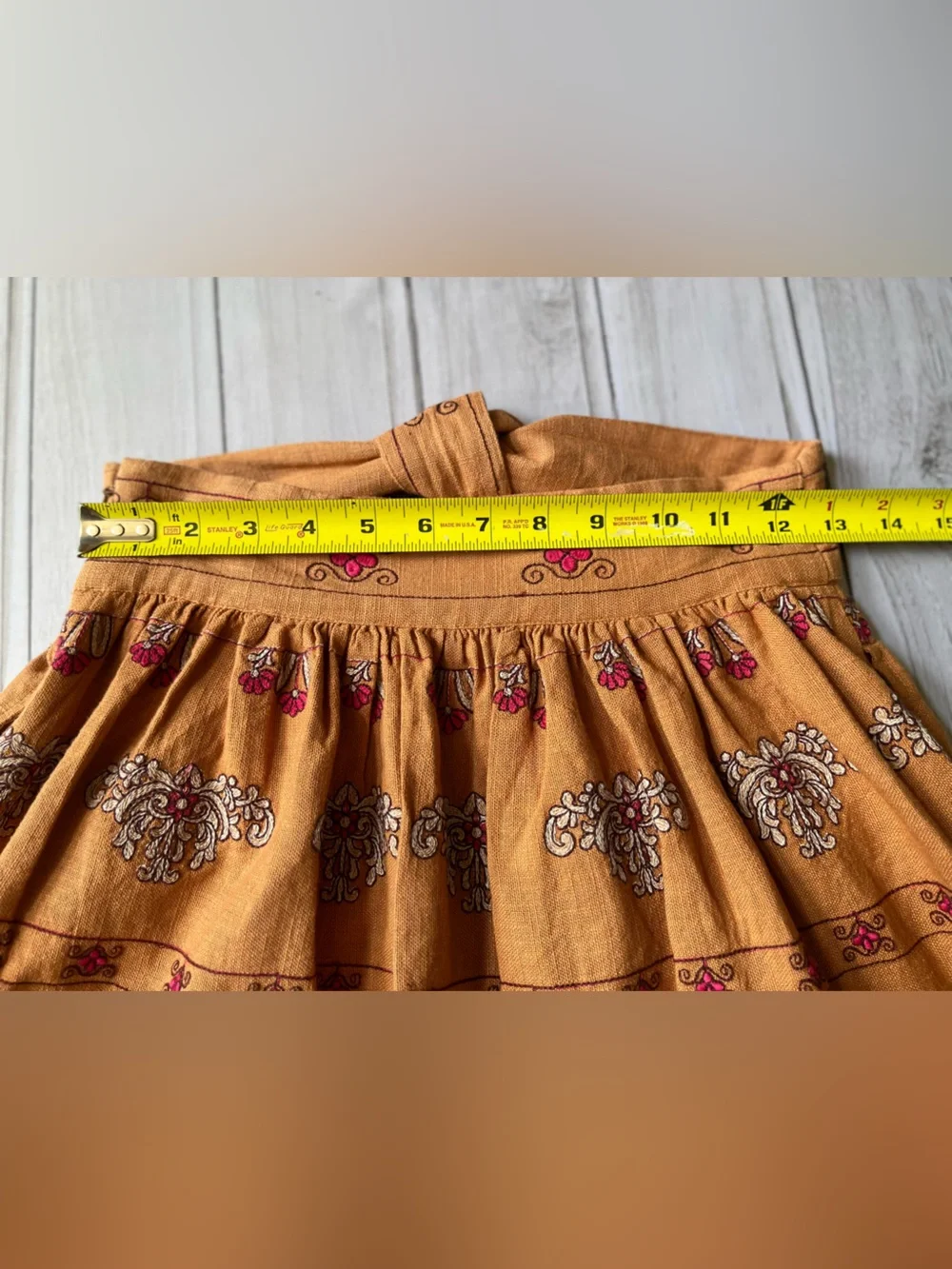 Anthropologie Meghan terracotta embroidered folkloric mini wrap skirt. Size 0